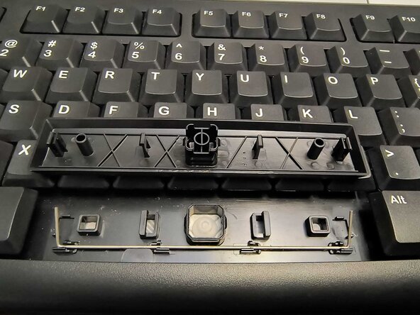 How to Fix a Jammed Key on a Logitech K120: crwdns2935265:04crwdnd2935265:03crwdnd2935265:03crwdne2935265:0