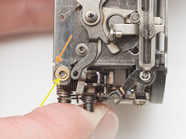 Pentax Super Program Mirror Box Mechanism Service, Remove shutter release lever: crwdns2935265:029crwdnd2935265:02crwdnd2935265:02crwdne2935265:0