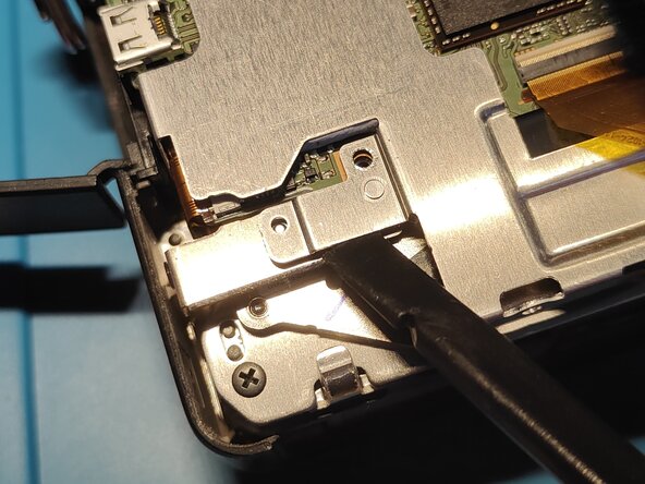 Sony A7 II Top Flex Cable replacement, Removing another metal bracket: crwdns2935265:018crwdnd2935265:02crwdnd2935265:03crwdne2935265:0