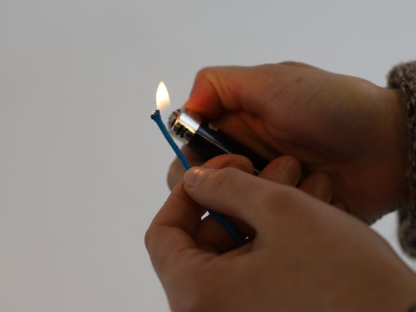 How to Replace a Speedlace With a Stopper, Seal the new lace tips: crwdns2935265:03crwdnd2935265:02crwdnd2935265:03crwdne2935265:0