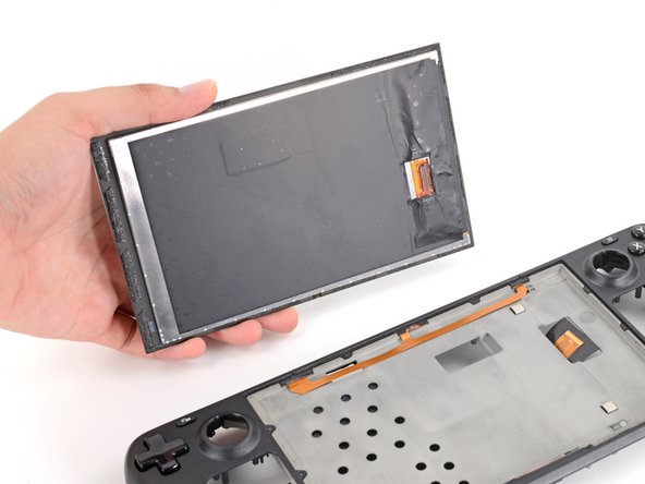 Steam Deck Front Shell Replacement, Lift up the display: crwdns2935265:083crwdnd2935265:03crwdnd2935265:03crwdne2935265:0