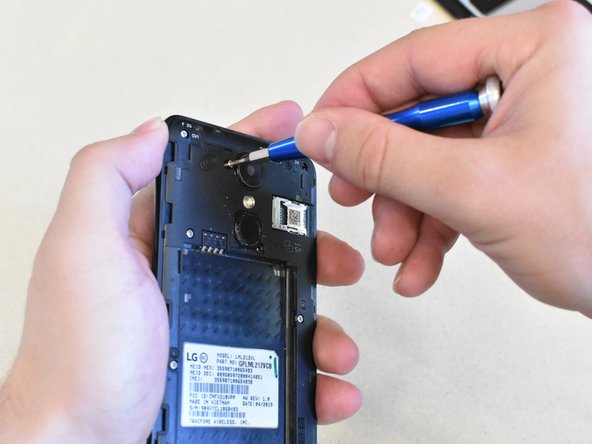 LG Rebel 4 LTE Disassembly, Remove Screws: crwdns2935265:03crwdnd2935265:03crwdnd2935265:03crwdne2935265:0