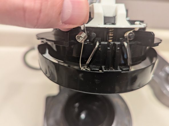 Nespresso Vertuo Evoluo Bearing Replacement, Remove capsule catch bar springs: crwdns2935265:04crwdnd2935265:03crwdnd2935265:03crwdne2935265:0