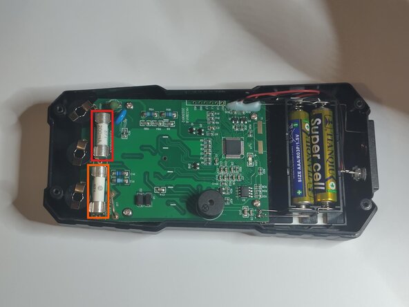 Changement fusibles Multimètre Velleman DVM020, Enlever les fusibles: étape 6, image 1 de 3