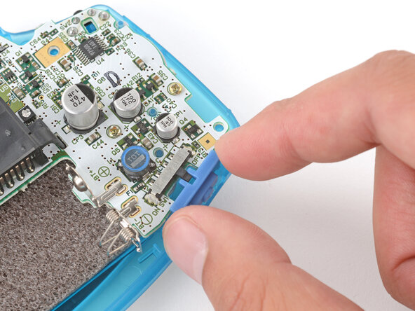 How to Reshell Your Game Boy Advance, Install the power switch cover: crwdns2935265:030crwdnd2935265:02crwdnd2935265:03crwdne2935265:0