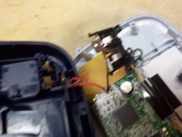 Brother P-Touch PT-M95 Teardown, Remove the gears and the battery contacts: crwdns2935265:04crwdnd2935265:02crwdnd2935265:02crwdne2935265:0