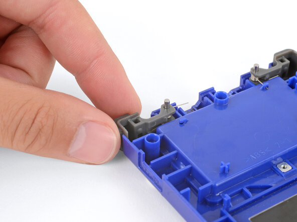 Nintendo Game Boy Advance SP Buttons Replacement, Remove the shoulder buttons: crwdns2935265:08crwdnd2935265:01crwdnd2935265:02crwdne2935265:0