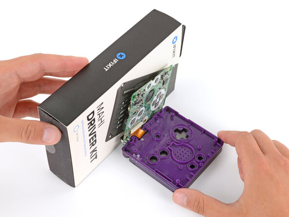 How to Reshell Your Game Boy Advance SP, Flip the main body over: crwdns2935265:055crwdnd2935265:01crwdnd2935265:01crwdne2935265:0