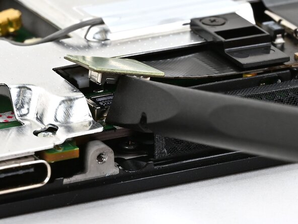 Nintendo Switch 2 MicroSD Card Reader Replacement, Disconnect the MicroSD card reader: crwdns2935265:019crwdnd2935265:03crwdnd2935265:03crwdne2935265:0