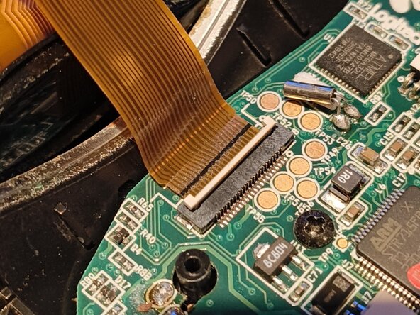 Logitech MX Air Battery Replacement, Disconnect the cables: crwdns2935265:04crwdnd2935265:03crwdnd2935265:03crwdne2935265:0