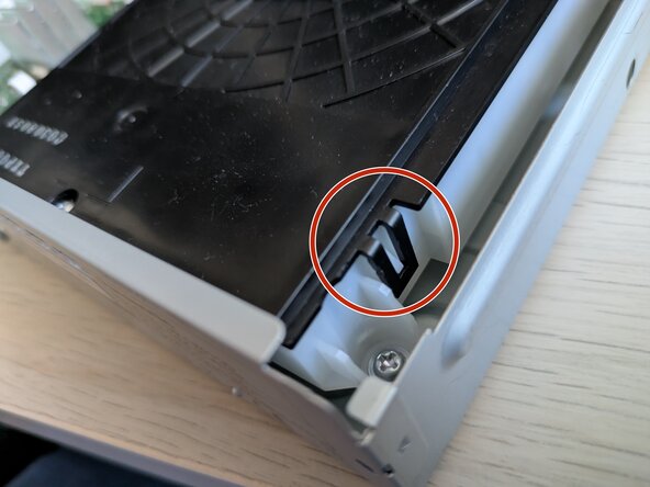 Panasonic DP-UB150-K Laser Replacement, Loosen drive lid: crwdns2935265:05crwdnd2935265:02crwdnd2935265:03crwdne2935265:0