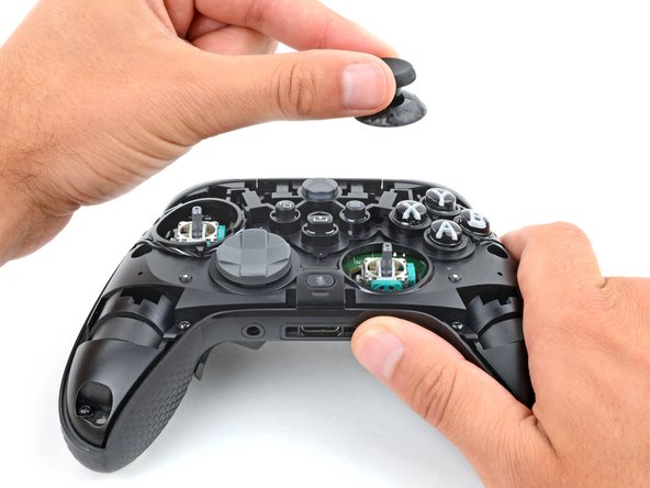 Scuf Instinct Pro Thumbstick Covers Replacement, Remove the thumbstick covers: crwdns2935265:03crwdnd2935265:03crwdnd2935265:03crwdne2935265:0