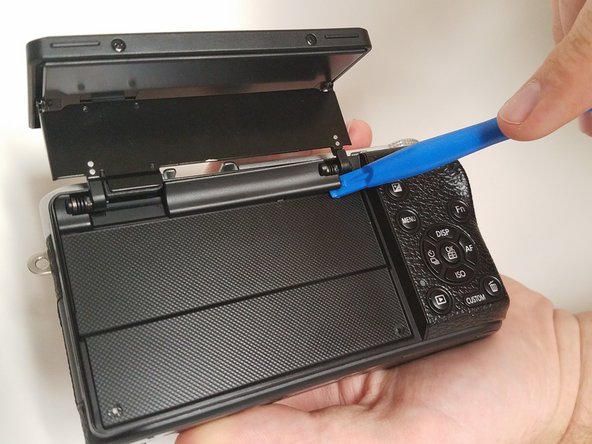 Samsung NX500 Main board  Replacement, Screen Side Encasement: crwdns2935265:04crwdnd2935265:02crwdnd2935265:03crwdne2935265:0