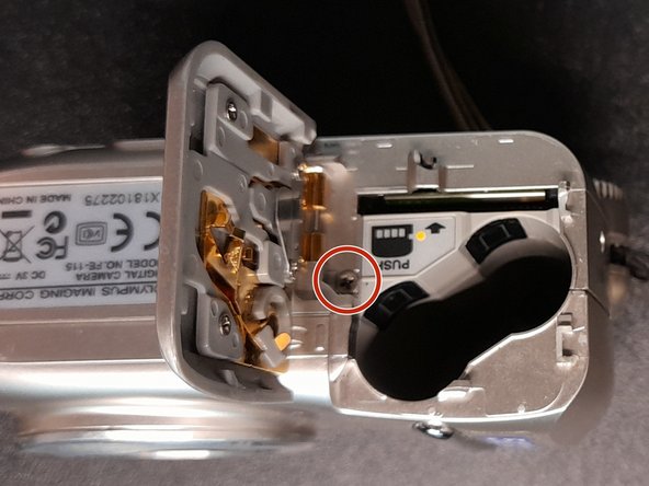 Olympus FE-115 Case removal, Unscrew: crwdns2935265:03crwdnd2935265:03crwdnd2935265:03crwdne2935265:0