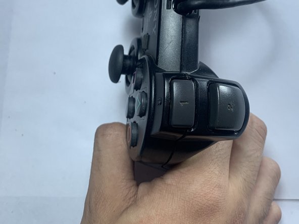 PlayStation 2 Controller L/R Trigger and Shoulder Buttons Replacement: crwdns2935265:06crwdnd2935265:02crwdnd2935265:02crwdne2935265:0