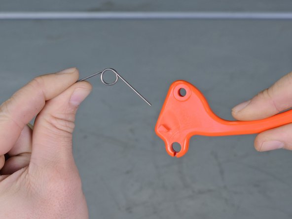 Echo Power Pruner 254 cc PPT2620 2019 Throttle Trigger Replacement, Remove the trigger spring: crwdns2935265:09crwdnd2935265:02crwdnd2935265:02crwdne2935265:0