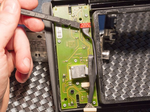 Disassembling Audi Navigation Plus unit: step 20, image 2 of 2