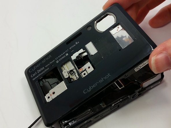 Sony Cyber-shot DSC-TX7 Front Sliding Lens Cover Replacement: crwdns2935265:08crwdnd2935265:02crwdnd2935265:02crwdne2935265:0