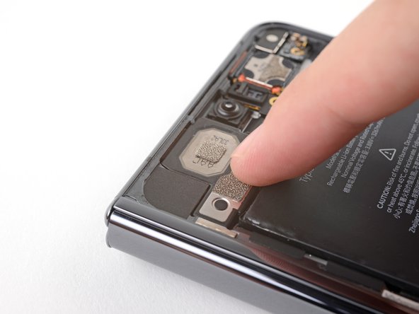 How to Apply New Top Speaker Adhesive in Your Google Pixel Fold, Secure the top speaker: crwdns2935265:03crwdnd2935265:03crwdnd2935265:03crwdne2935265:0