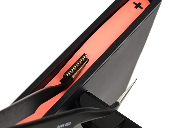 Nintendo Switch 2 Microphone Replacement, Pry up the right side sticker: crwdns2935265:05crwdnd2935265:03crwdnd2935265:03crwdne2935265:0