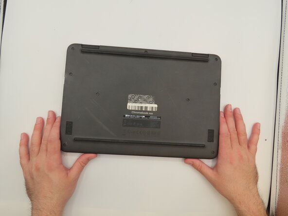 Dell Chromebook 3100 IO Board Replacement, Back Panel: crwdns2935265:01crwdnd2935265:02crwdnd2935265:03crwdne2935265:0