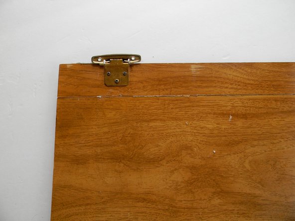 After at least 15 minutes you can pull tape off completely and wipe away any excess epoxy. It is now finished and ready to be re-installed back to the cabinet.