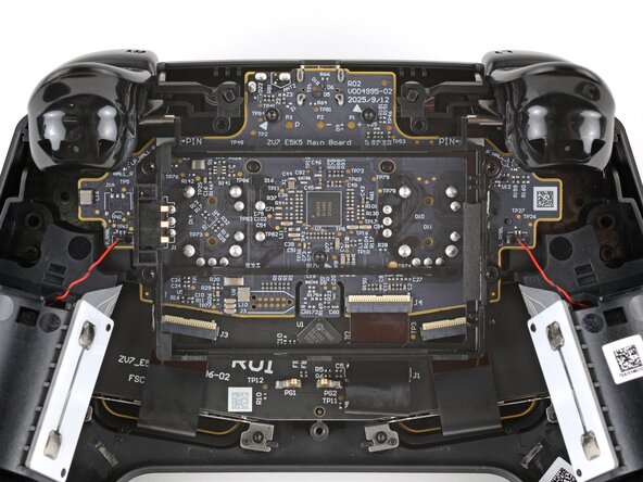 Steam Controller (2nd Gen, 2026) FSC Board Replacement, Remove the mounting bracket screws: step 5, image 2 of 2