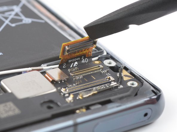 Mi 11 Screen Replacement, Disconnect the display flex cable: crwdns2935265:019crwdnd2935265:02crwdnd2935265:02crwdne2935265:0