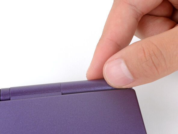 How to Reshell Your Game Boy Advance SP, Put the hinge cover into place: crwdns2935265:048crwdnd2935265:03crwdnd2935265:03crwdne2935265:0