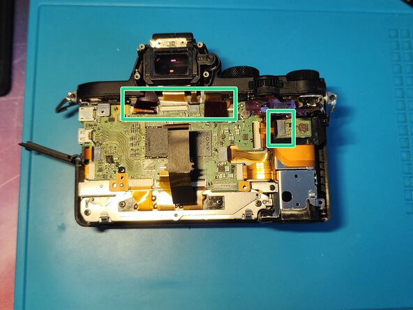 Sony A7 II Top Flex Cable replacement, Removing the motherboard / EVF (check notes): crwdns2935265:019crwdnd2935265:01crwdnd2935265:03crwdne2935265:0