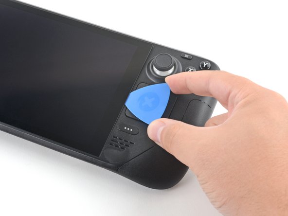 Steam Deck Screen Replacement, Slice the right side adhesive: crwdns2935265:032crwdnd2935265:02crwdnd2935265:03crwdne2935265:0