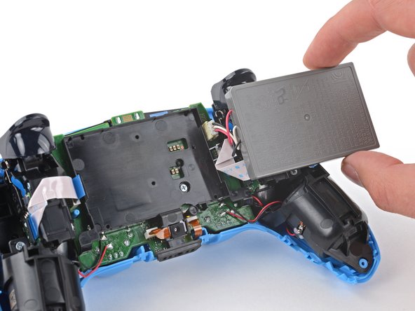 DualSense Controller v2 Vibration Motor Replacement, Reposition the battery: crwdns2935265:012crwdnd2935265:02crwdnd2935265:02crwdne2935265:0