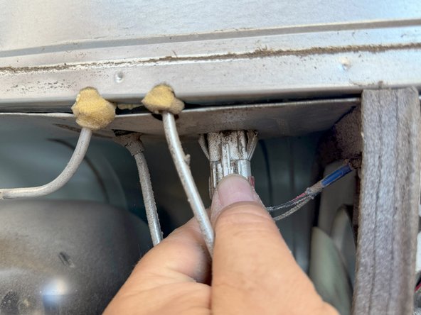 Samsung Older French Door Refrigerator Condenser Fan Replacement, Disconnect the condenser fan: step 4, image 2 of 3