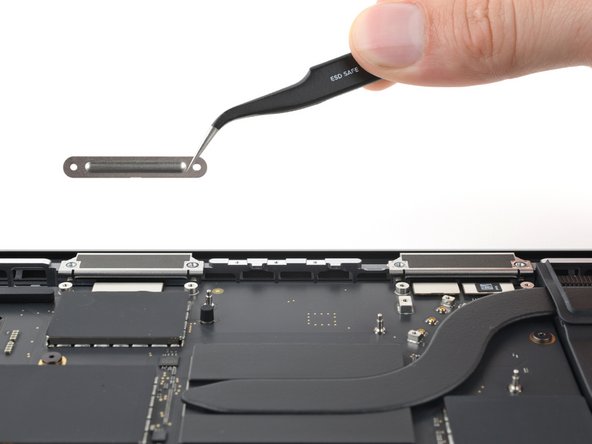 MacBook Pro 14" Late 2023 (M3) Screen Replacement, Remove the screen connector covers: crwdns2935265:027crwdnd2935265:03crwdnd2935265:03crwdne2935265:0