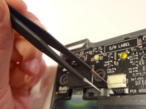 Boogie Board Rip Internal Antenna Replacement, Remove the antenna connector from the motherboard: crwdns2935265:07crwdnd2935265:02crwdnd2935265:02crwdne2935265:0