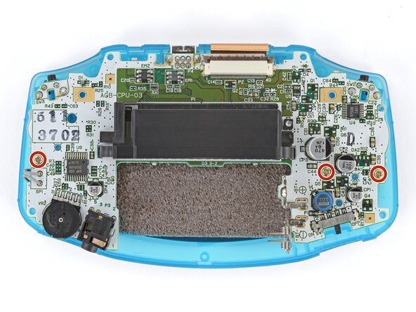 How to Reshell Your Game Boy Advance, Install the motherboard screws: crwdns2935265:027crwdnd2935265:02crwdnd2935265:03crwdne2935265:0