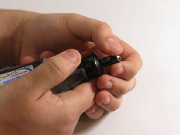 Dremel MultiPro 395 Armature Replacement, Removing the chuck cap: crwdns2935265:05crwdnd2935265:02crwdnd2935265:03crwdne2935265:0