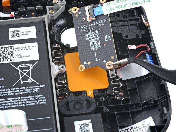 Steam Deck Front Shell Replacement, Remove the touchpad board: crwdns2935265:022crwdnd2935265:02crwdnd2935265:02crwdne2935265:0