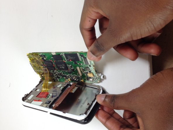 Creative Zen Vision M Screen Replacement, Disconnecting the screen from the motherboard: crwdns2935265:06crwdnd2935265:03crwdnd2935265:03crwdne2935265:0