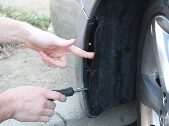 How to Replace the Front-Turn Signal Bulb in a 2011 Subaru Impreza Outback Sport: step 3, image 1 of 2