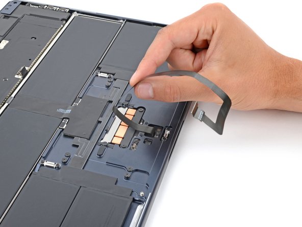 MacBook Air 15" 2024 Trackpad Replacement, Separate the trackpad cable adhesive: crwdns2935265:016crwdnd2935265:02crwdnd2935265:03crwdne2935265:0