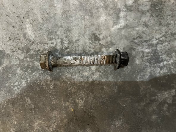 Chevrolet SS Sedan Rear Shock Absorber Replacement, Disconnect Strut from the Control Arm: crwdns2935265:08crwdnd2935265:03crwdnd2935265:03crwdne2935265:0