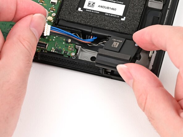 Nintendo Switch 2 Left Joy-Con 2 Connector Replacement, Install the left speaker: crwdns2935265:049crwdnd2935265:02crwdnd2935265:03crwdne2935265:0