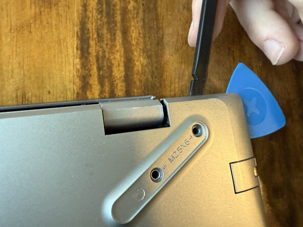 HP Pavilion-15-cs3063cl Battery Replacement, Release Case Clamps: crwdns2935265:03crwdnd2935265:03crwdnd2935265:03crwdne2935265:0