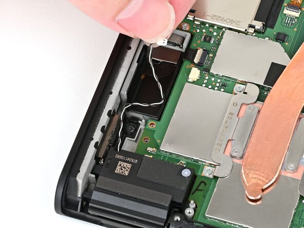 Nintendo Switch 2 Speakers Replacement, Unroute the right speaker cable: crwdns2935265:038crwdnd2935265:03crwdnd2935265:03crwdne2935265:0