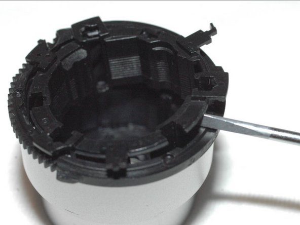 Repairing Casio Exilim EX-Z350 Lens mechanics, Disassemble lens (5): crwdns2935265:016crwdnd2935265:03crwdnd2935265:03crwdne2935265:0