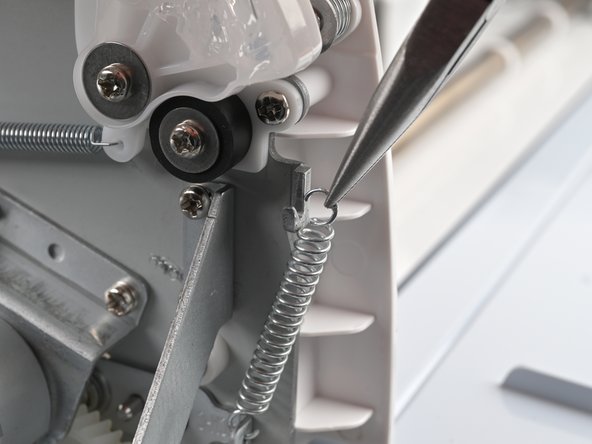 Cricut Maker 3 Rubber Rollers Replacement, Remove the left roller bar spring: crwdns2935265:019crwdnd2935265:02crwdnd2935265:02crwdne2935265:0