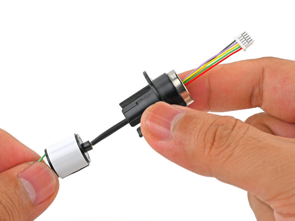 Logitech RS50 Base Slip Ring vervangen, De sleepring in de adapter installeren: stap 30, afbeelding 1 van 3