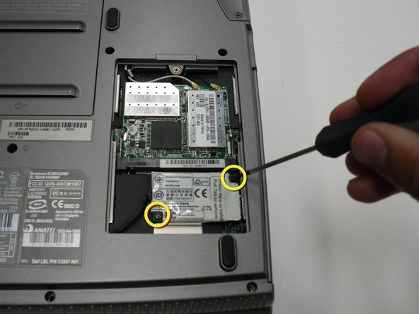 Removing the Dell Inspiron 1150 Modem Card: crwdns2935265:03crwdnd2935265:02crwdnd2935265:02crwdne2935265:0
