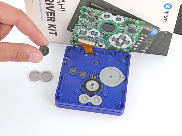 Nintendo Game Boy Advance SP Buttons Replacement, Remove the silicone pads: crwdns2935265:012crwdnd2935265:02crwdnd2935265:03crwdne2935265:0